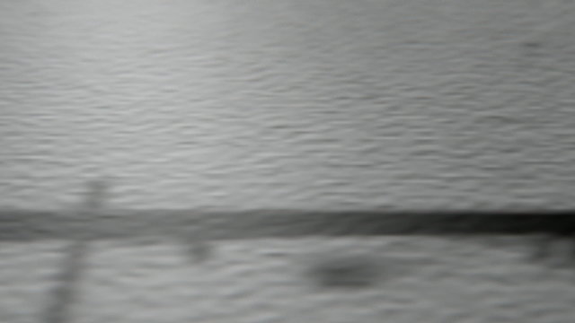 An extreme closeup pan of the progression of a time line inked onto paper showing years in chronological order from the past into the future