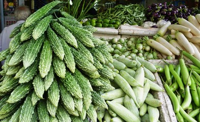 Colorful green and purple vegetable at an Asian street market