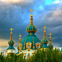 Fototapeta na wymiar Golden Domes of Saint Andrew's Church in Kiev