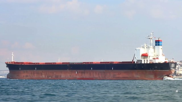 Large oil tanker ship sails in the sea. Large oil tanker, Side view 
