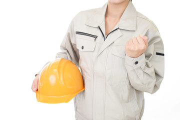 ヘルメットを持つ労働者