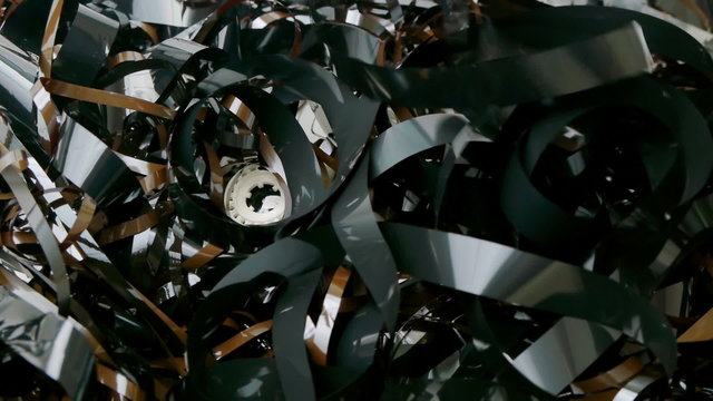 Video and Audio tape stacking on a tangled heap.