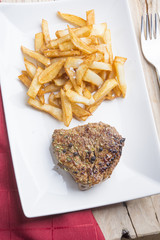 Rustic grilled beefsteak with french fries