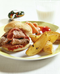 Roast beef sandwich and potato wedges