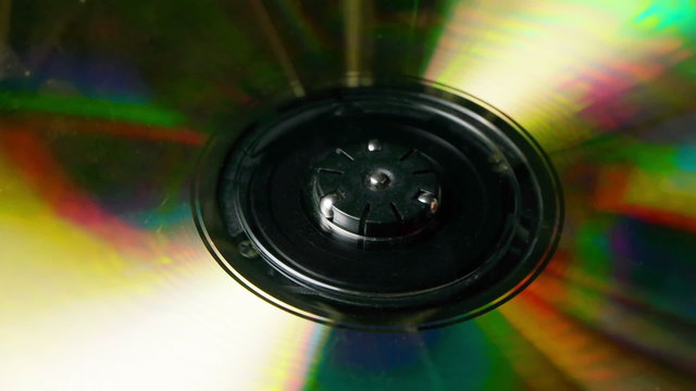 CD placed on player and starts to spin.