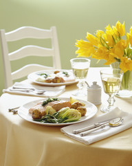 Food served on plate with wine glass