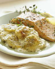 Scalloped potatoes with salmon dinner