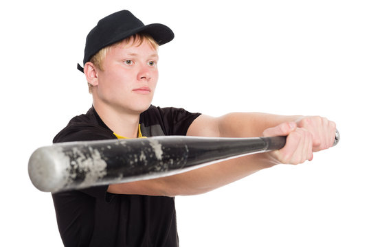 Serious baseball player bat preparing to strike