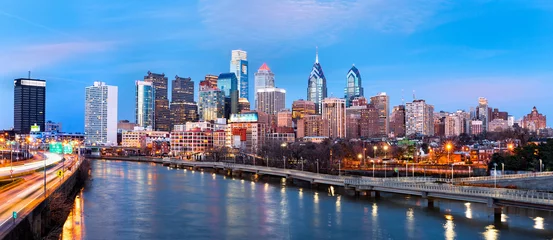 Peel and stick wall murals City building Philadelphia skyline panorama at dusk.  Schuylkill expressway traffic runs parallel to Schuylkill river.