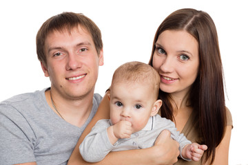 Happy young parents with their favorite son