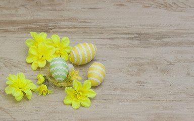 Colorful Easter Eggs on the  Wood Background