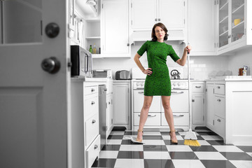Woman wife finishes cleaning entire kitchen spotless immaculate tired exhausted 