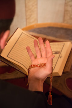 Muslim man reading the koran