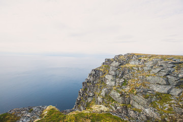 Fototapeta na wymiar Classic norwegian scandinavian summer mountain landscape view with mountains, fjord, lake with a blue sky, Norway, Lofoten Islands