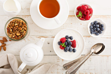 Obraz na płótnie Canvas Natural yogurt in a bowl with berries