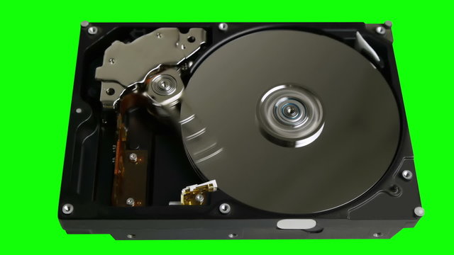 Hard Disk Drive Reading Data on Green Screen Background
