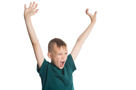 Screaming boy with hands raised