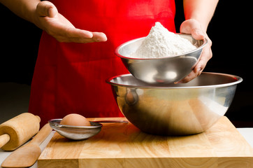 Preparation Cooking bakery,holding the bowl of flour ready to cook