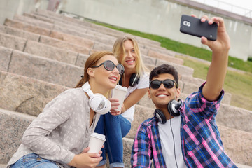 Obraz premium Make selfie photos with friends