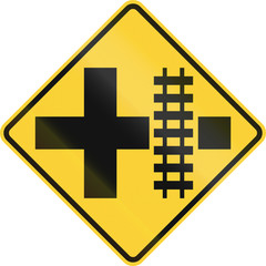 United States MUTCD road sign - Level crossing and intersection