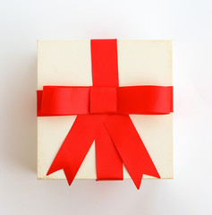 Red bow gift on white background.