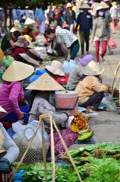 Seller on the colour market in Vietnam