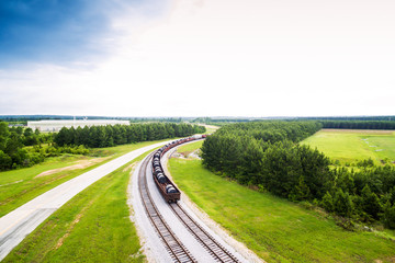 Fototapeta premium Aerial 1 - steel coils in rail cars on train tracks in Alabama