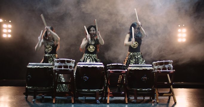 4K, very epic performance of Japanese Taiko drummers on stage, various rhythm and movement, slow motion