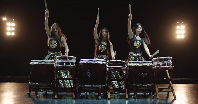 very epic performance of three Japanese Taiko drummer on stage, with sound,various rhythm