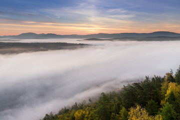 Naklejka na ściany i meble dense morning fog in south ural mountains during autumn