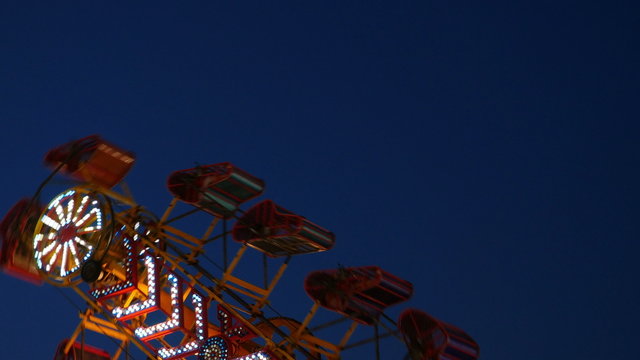 4K Zipper Carnival Ride Spinning at Twilight 1