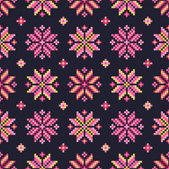 Seamless vector background with colorful Norwegian snowflakes. Print. Repeating background. Cloth design, wallpaper.
