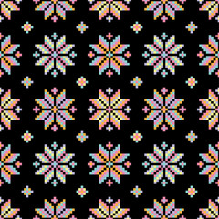 Seamless vector background with colorful Norwegian snowflakes. Print. Repeating background. Cloth design, wallpaper.