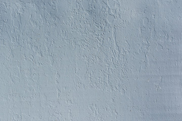 Gray wall of pimples