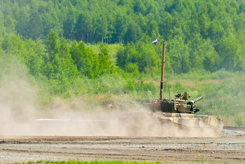 Nizhniy Tagil, Russia - July 12. 2008: T80 tank with equipment for speeding up of water crossing and Terminator Tank Support Fighting Vehicle. Russia Arms Expo exhibition