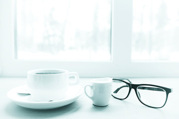 Concept winter breakfast, box, coffee, glasses