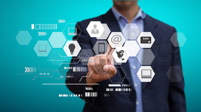 Businessman working on visual interface computer icon. Design concept of Business and technology Internet. Social network. E-commerce.