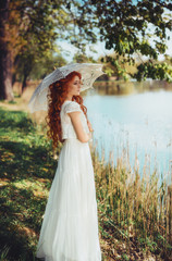Dreams. Vintage beautiful woman admiring nature