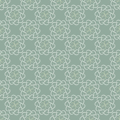 Pattern of light leaves or hearts on olive-green background