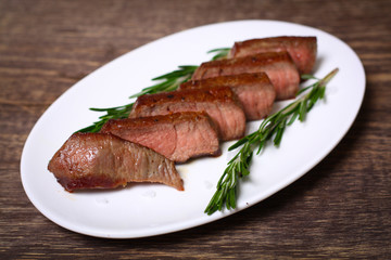 medium roast rib-eye steak with pepper, thyme and salt