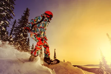 Photo sur Plexiglas Sports dhiver Snowboarder doing a toe side carve