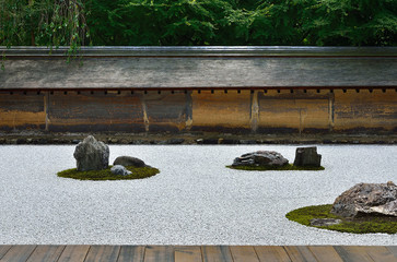 rock garden of Ryouanji temple in summer, Kyoto Japan.