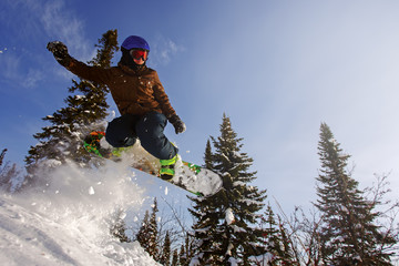 Snowboarder jumping