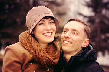Fototapeta premium young couple in autumn park.