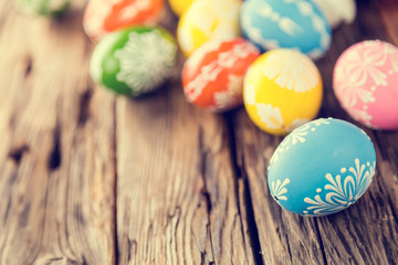 Easter eggs on wooden background
