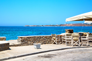 table in santorini  greece old restaurant chair  summer