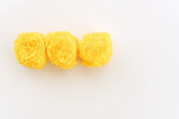 Sweet egg floss isolate on white background - dry sweet egg floss desert
Four kind of Thailand traditional dessert in thai name of Foi Thong or fios de ovos