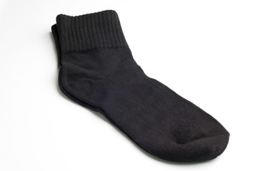 black socks on white background.