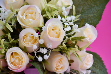 Close-up artificial white roses.
