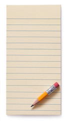 Photo of the yellow pencil lying on yellow sticky note pad. Isolated on white background